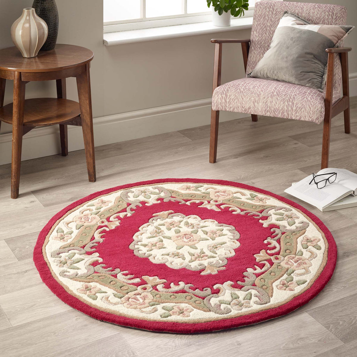 Shensi Wine Red Wool Rug with a traditional floral pattern, styled on wooden flooring.