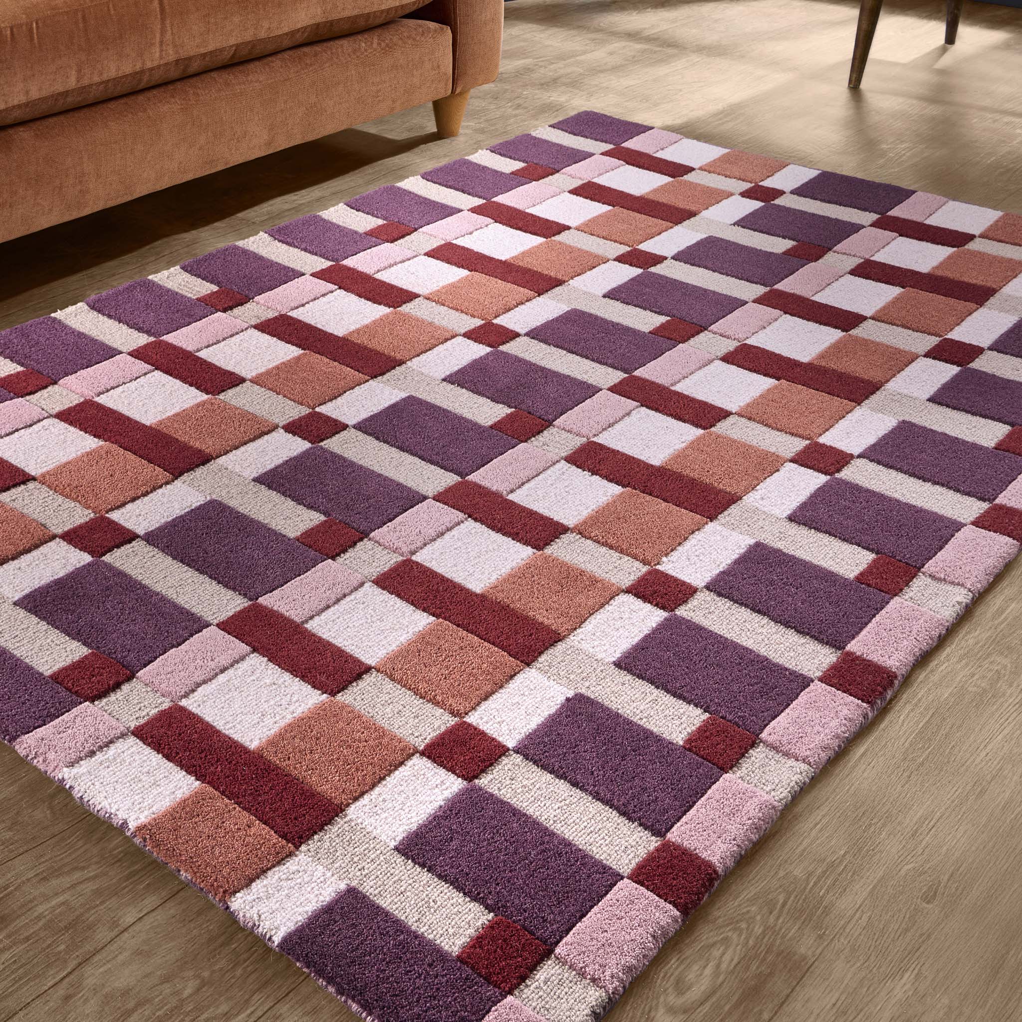 Discover the Sienna Weave Rug- 100% handwoven wool rug in pink, cream and purple. 