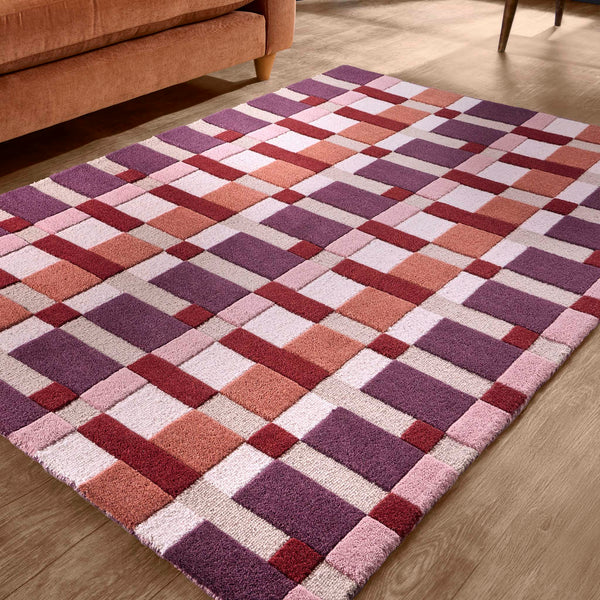 Discover the Sienna Weave Rug- 100% handwoven wool rug in pink, cream and purple. 