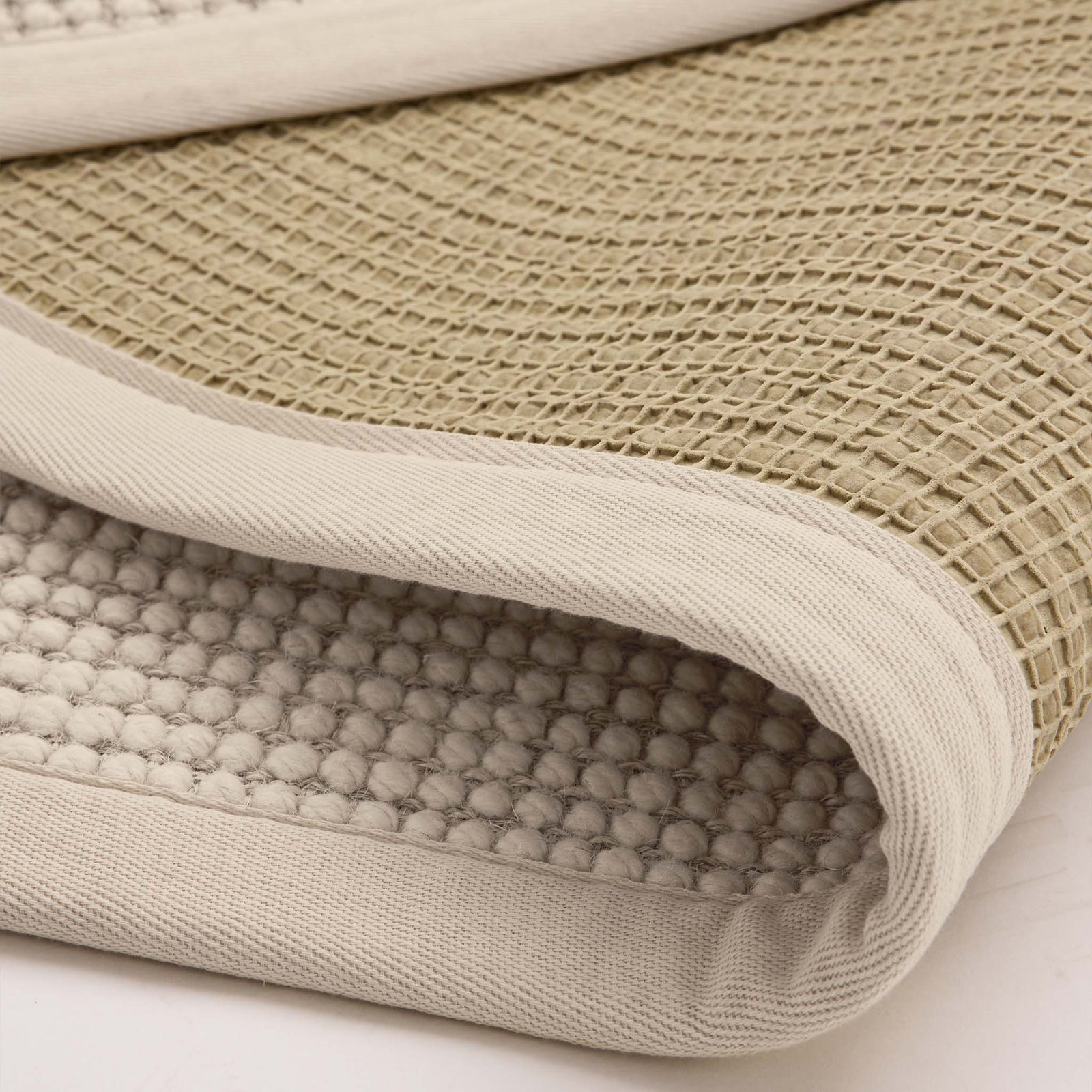 Sisal Boucle Beige Rug made from 100% wool with a beige border.