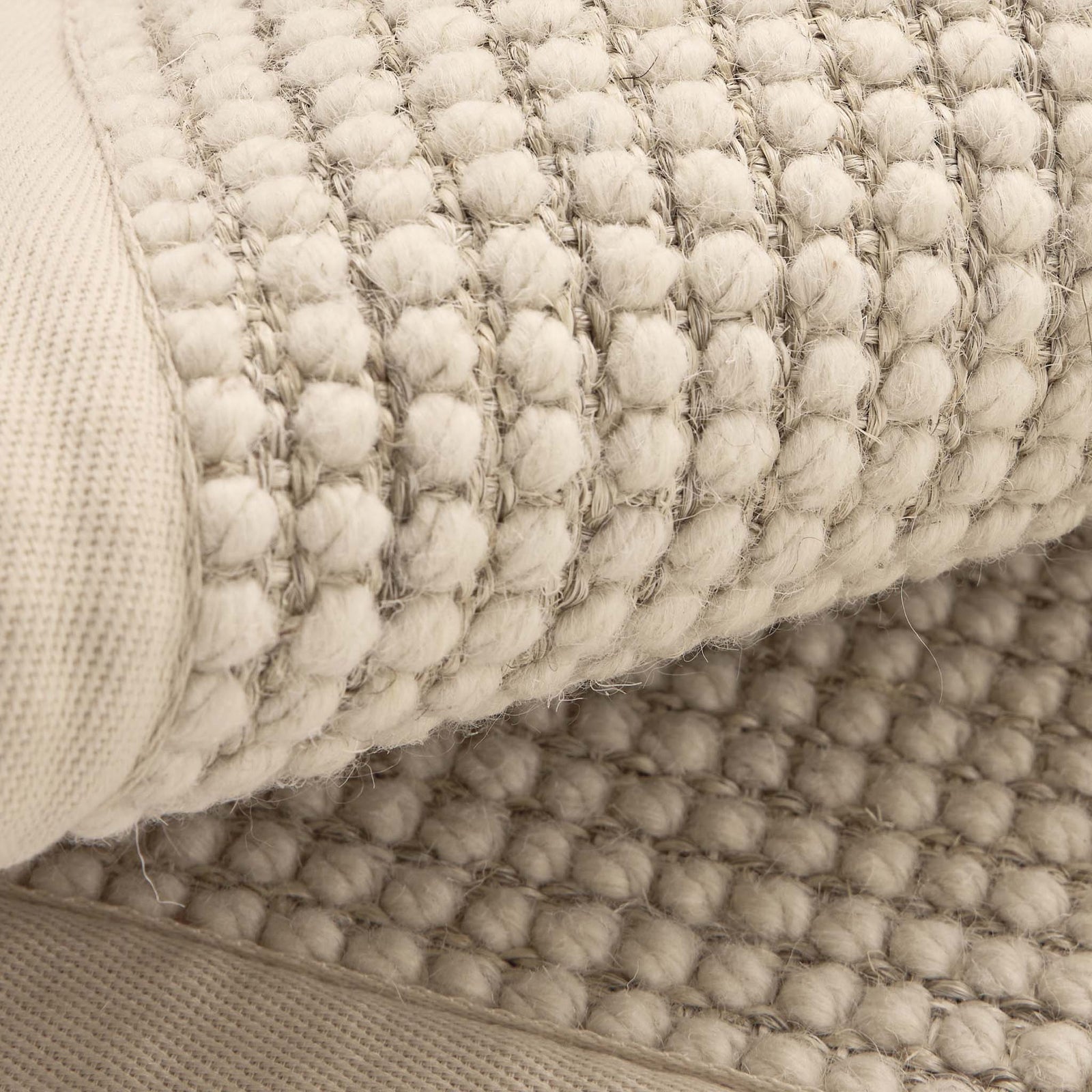Sisal Boucle Beige Rug made from 100% wool with a beige border.