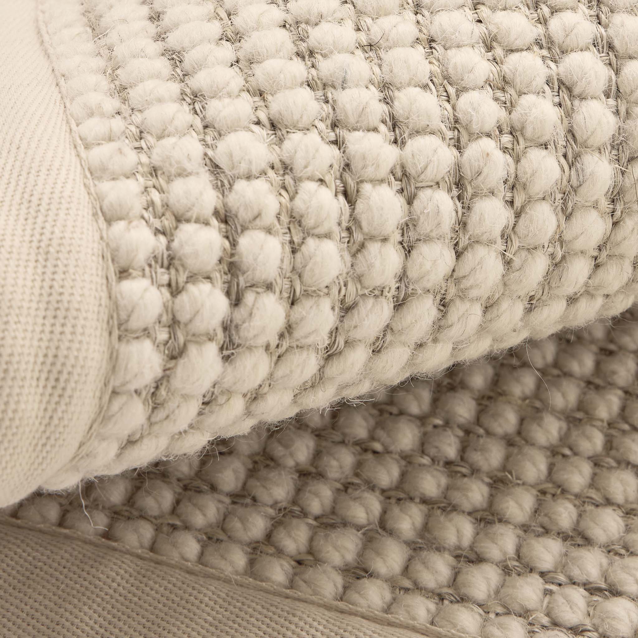 Sisal Boucle Beige Rug- a jute wool blend rug with a beige border. 