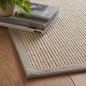 Sisal Boucle Grey Rug- a jute wool blend rug with a grey border. 
