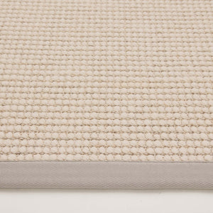Sisal Boucle Grey Rug- a jute wool blend rug with a grey border. 