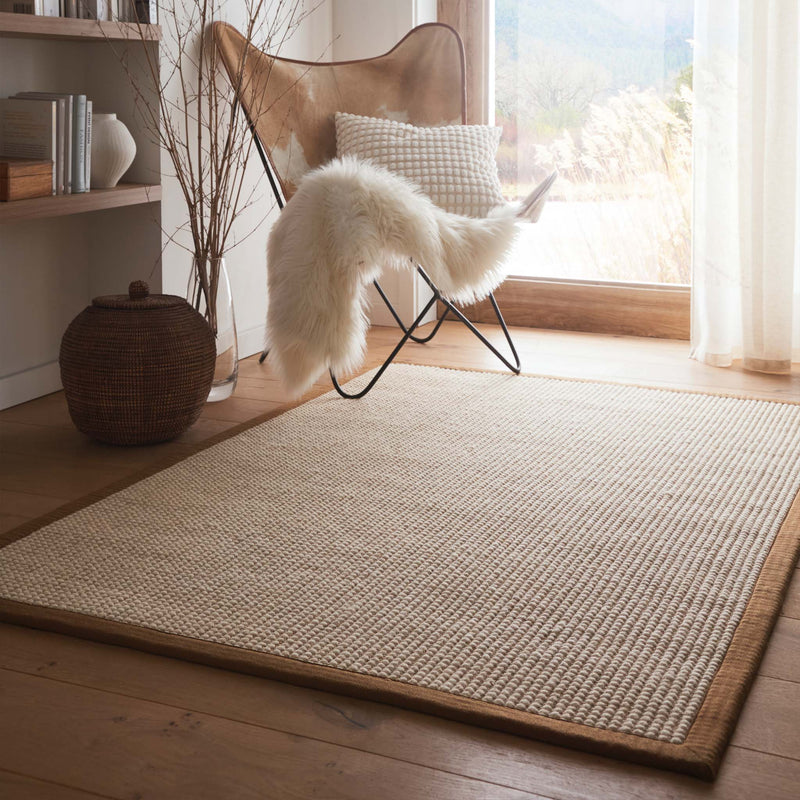 Sisal Boucle Mocha Rug made from 100% wool with a solid brown border. 