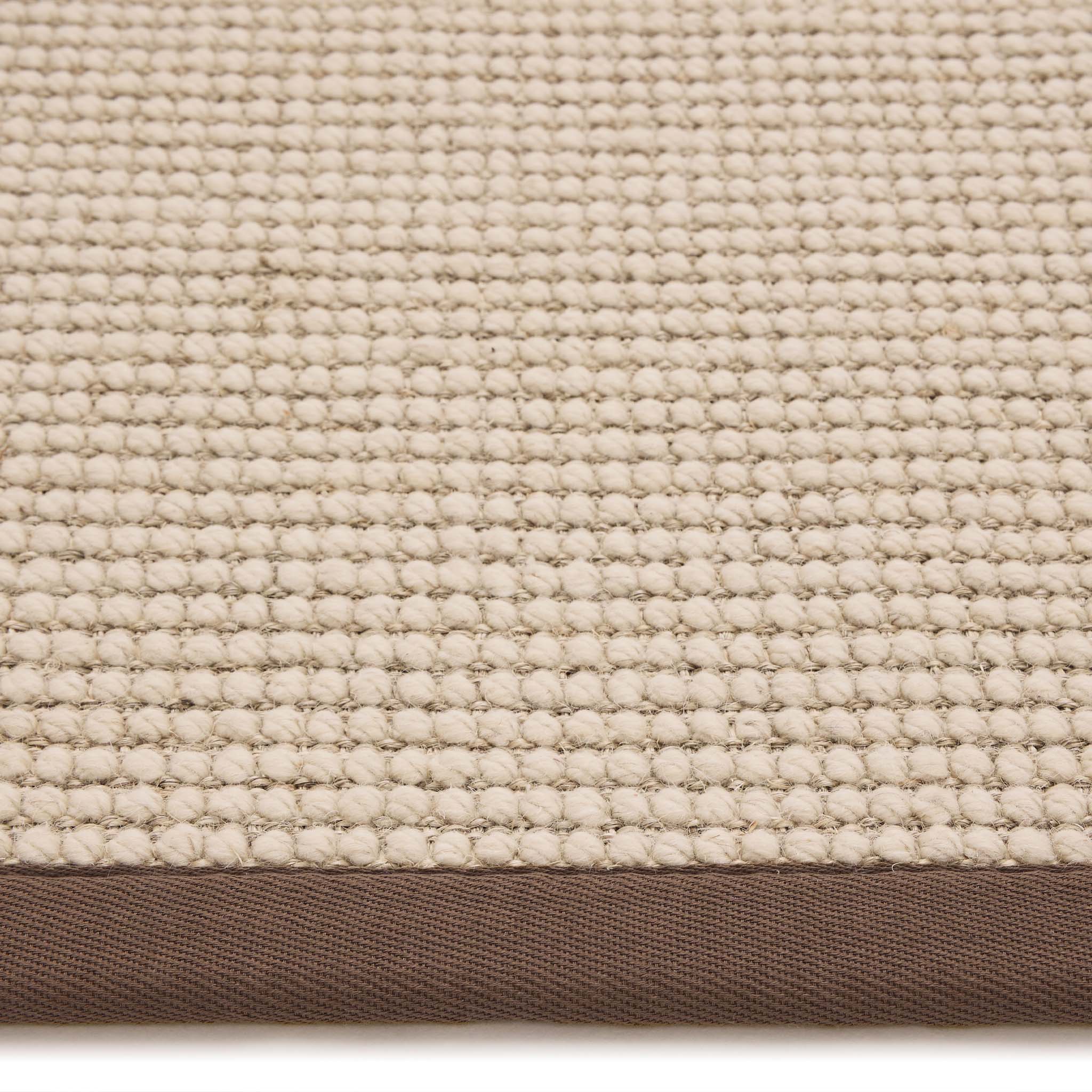 Sisal Boucle Mocha Rug made from 100% wool with a solid brown border. 