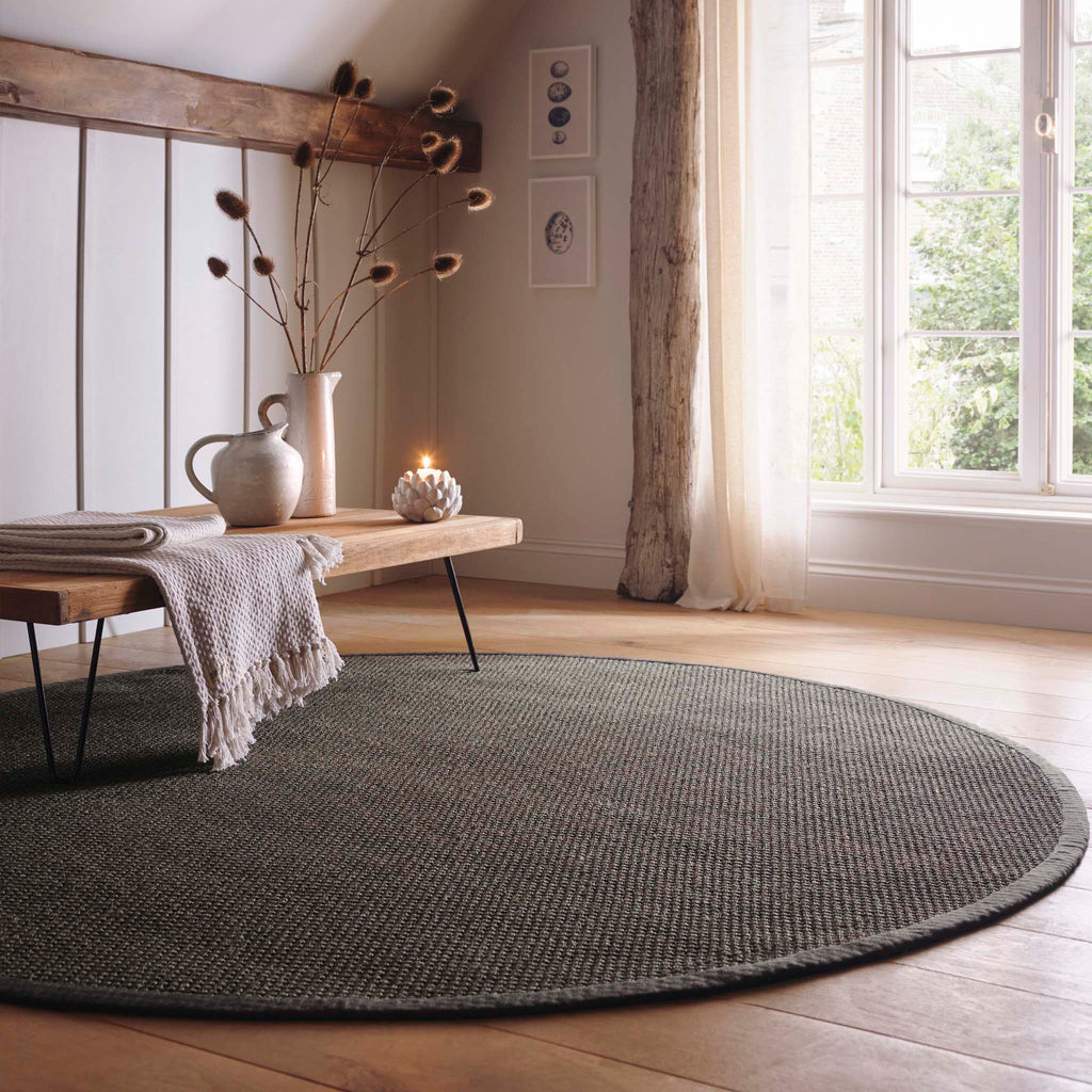 Sisal Grey with Dark Grey Border Circle Rug made from 100% sisal in a solid grey. 