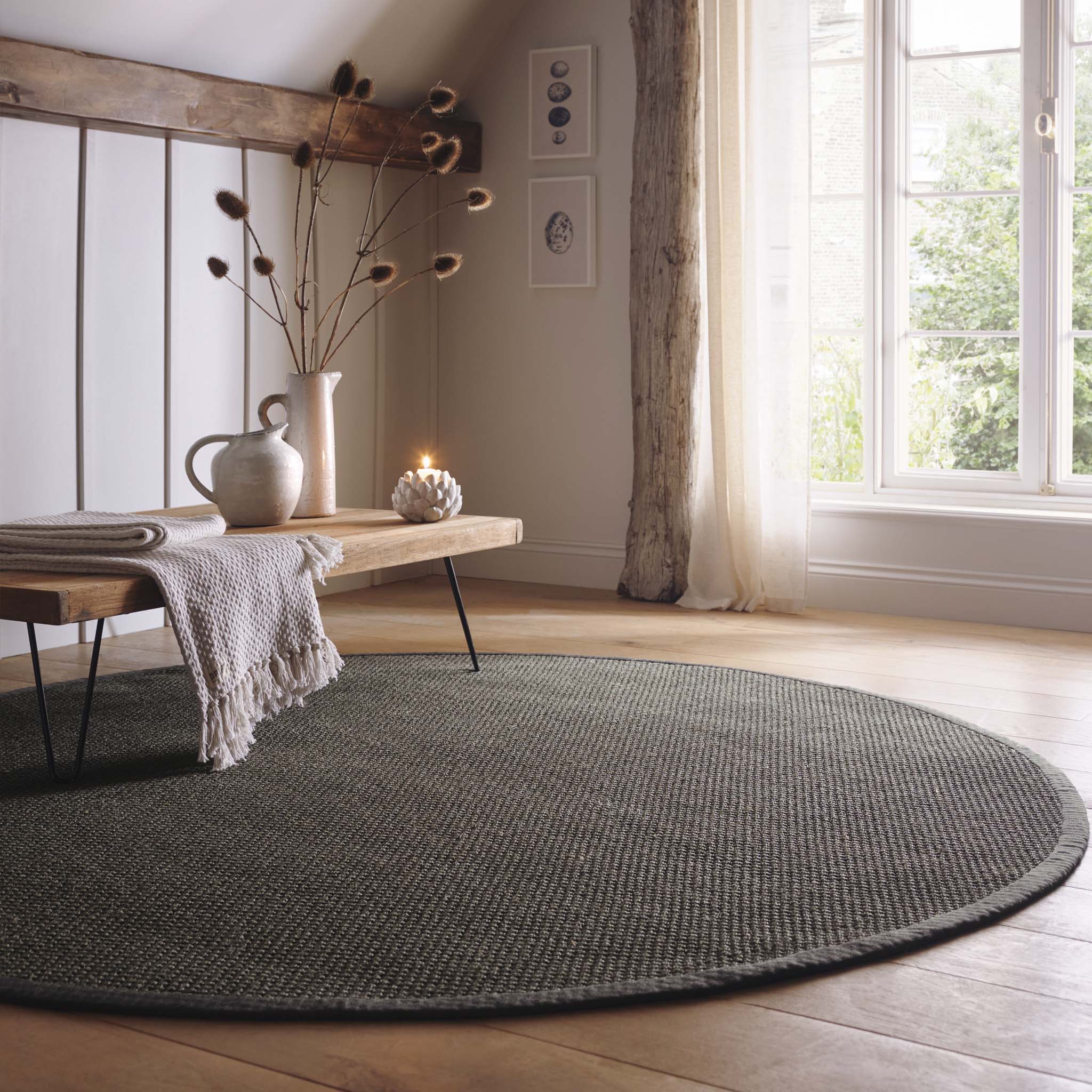 Sisal Grey with Dark Grey Border Circle Rug made from 100% sisal in a solid grey. 