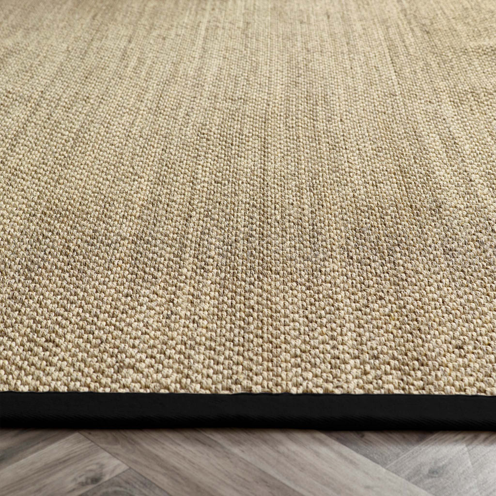 Sisal Rug- 100% Sisal rug with a black border. 