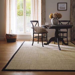Sisal Rug- 100% Sisal rug with a black border. 