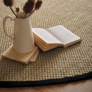 Sisal Rug- 100% Sisal rug with a black border. 