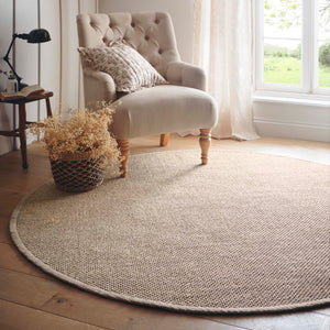 Sisal  Light Beige with Sand Border Rug- a 100% sisal circle rug in beige. 