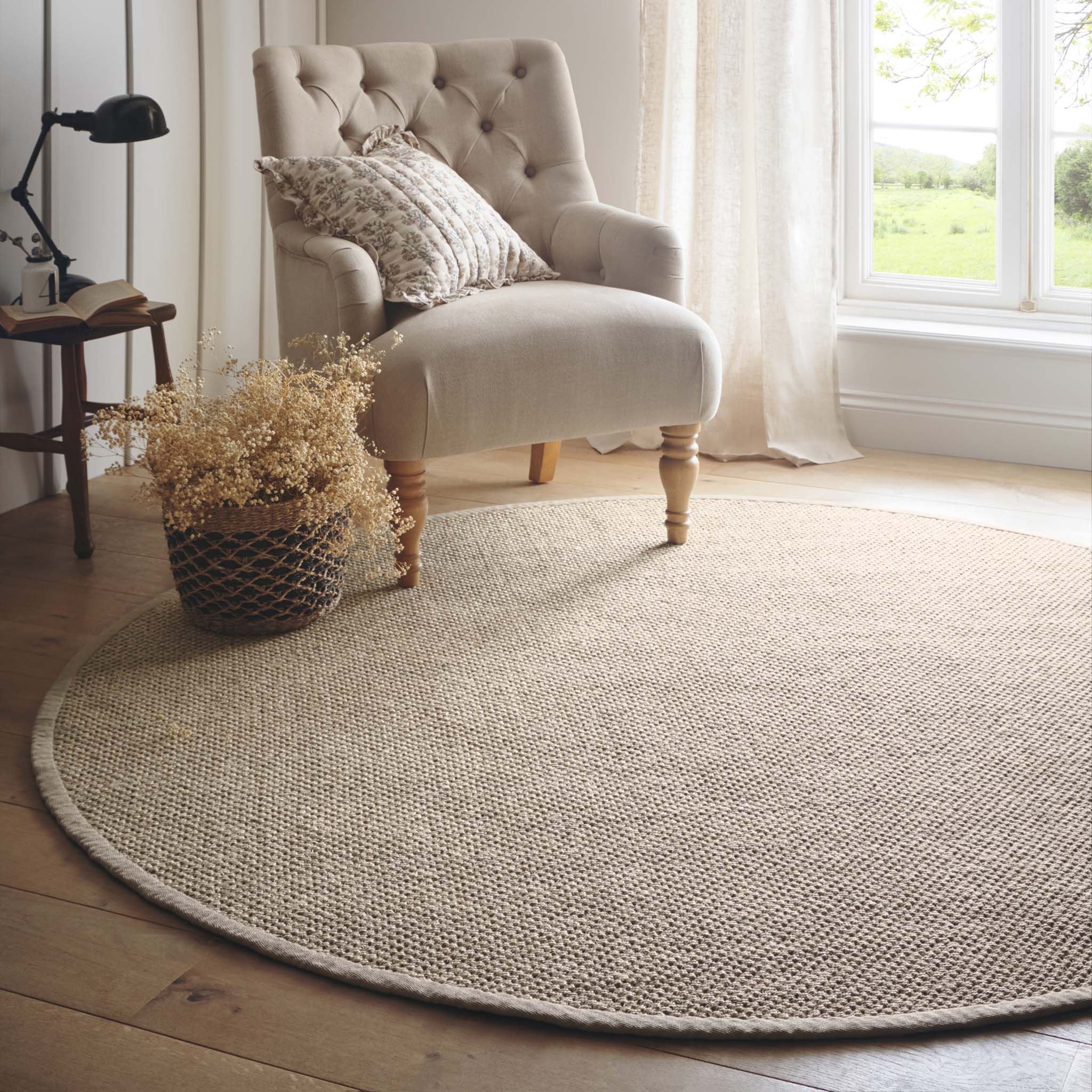 Sisal  Light Beige with Sand Border Rug- a 100% sisal circle rug in beige. 