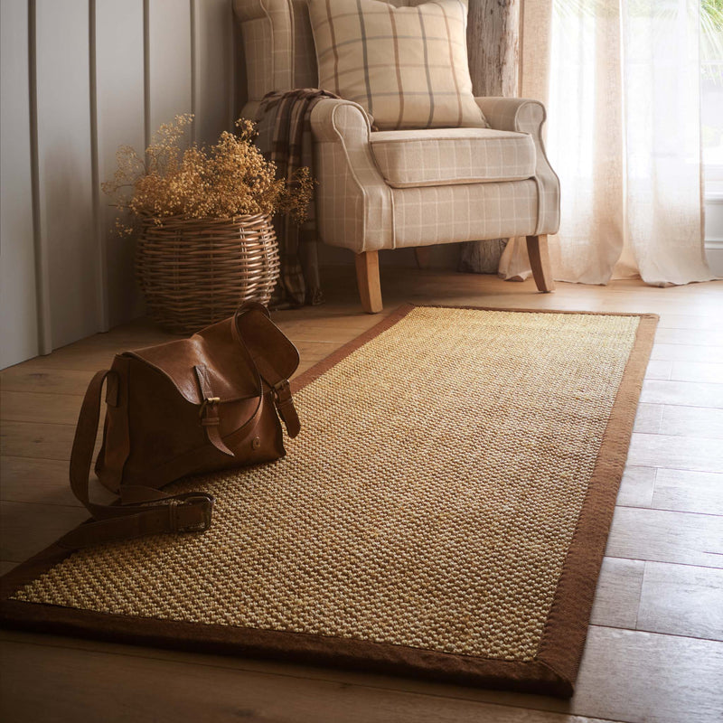 Sisal Warm Natural with Dark Brown Border Runner with a two toned border design, styled on wooden flooring.