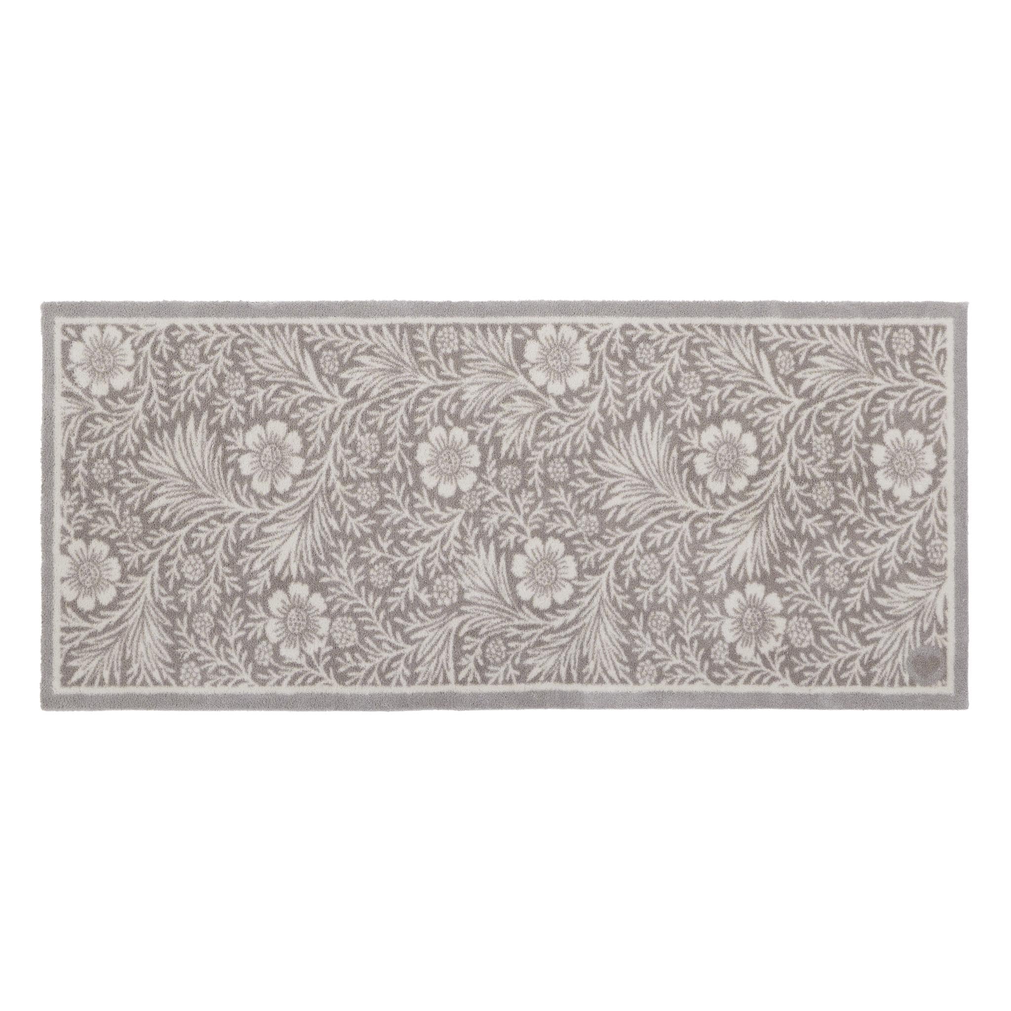 Soft Floral Washable Doormat- a cotton doormat featuring an elegant white floral pattern.