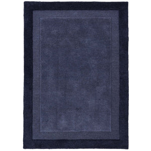 Stacked Borders Evening Blue Rug- a two toned 100% wool rug in blue.