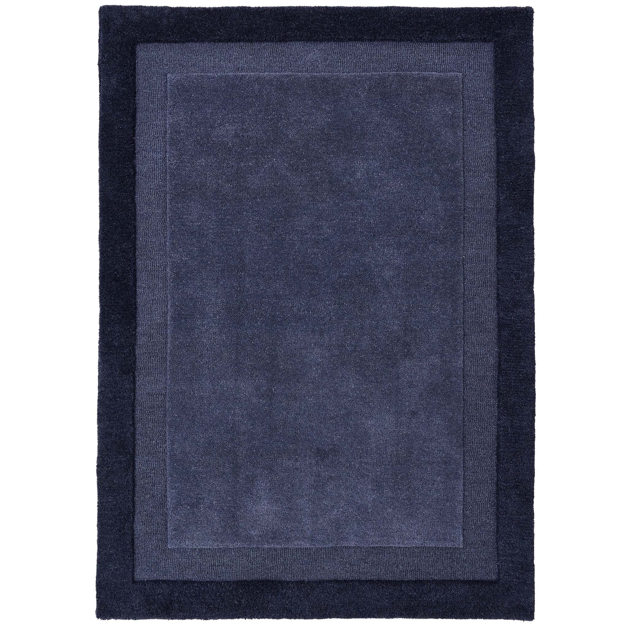 Stacked Borders Evening Blue Rug- a two toned 100% wool rug in blue.