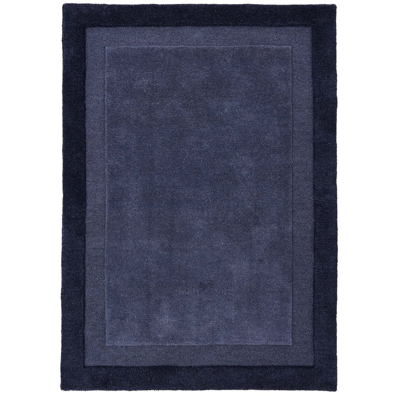Stacked Borders Evening Blue Rug- a two toned 100% wool rug in blue.