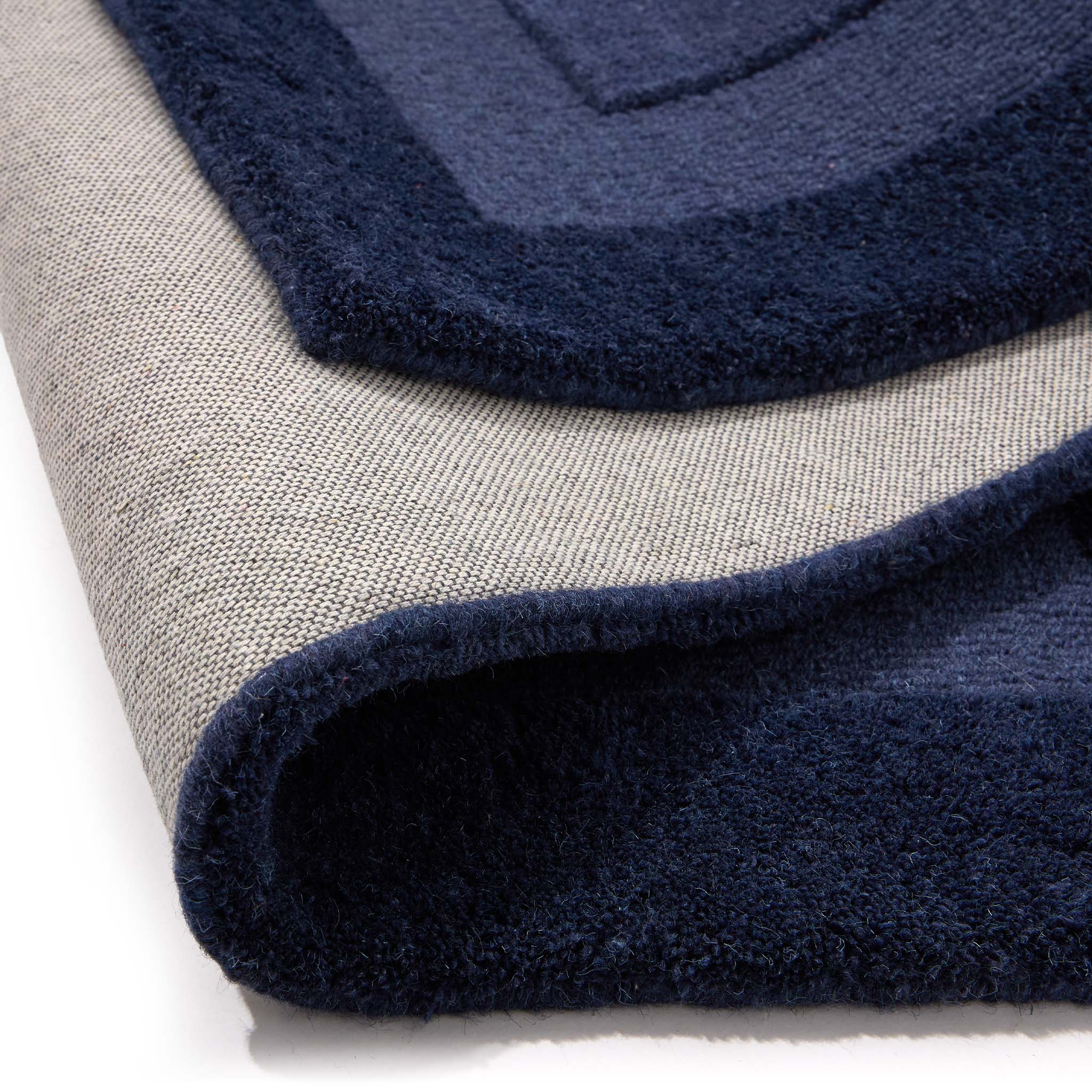 Stacked Borders Evening Blue Rug- a two toned 100% wool rug in blue.