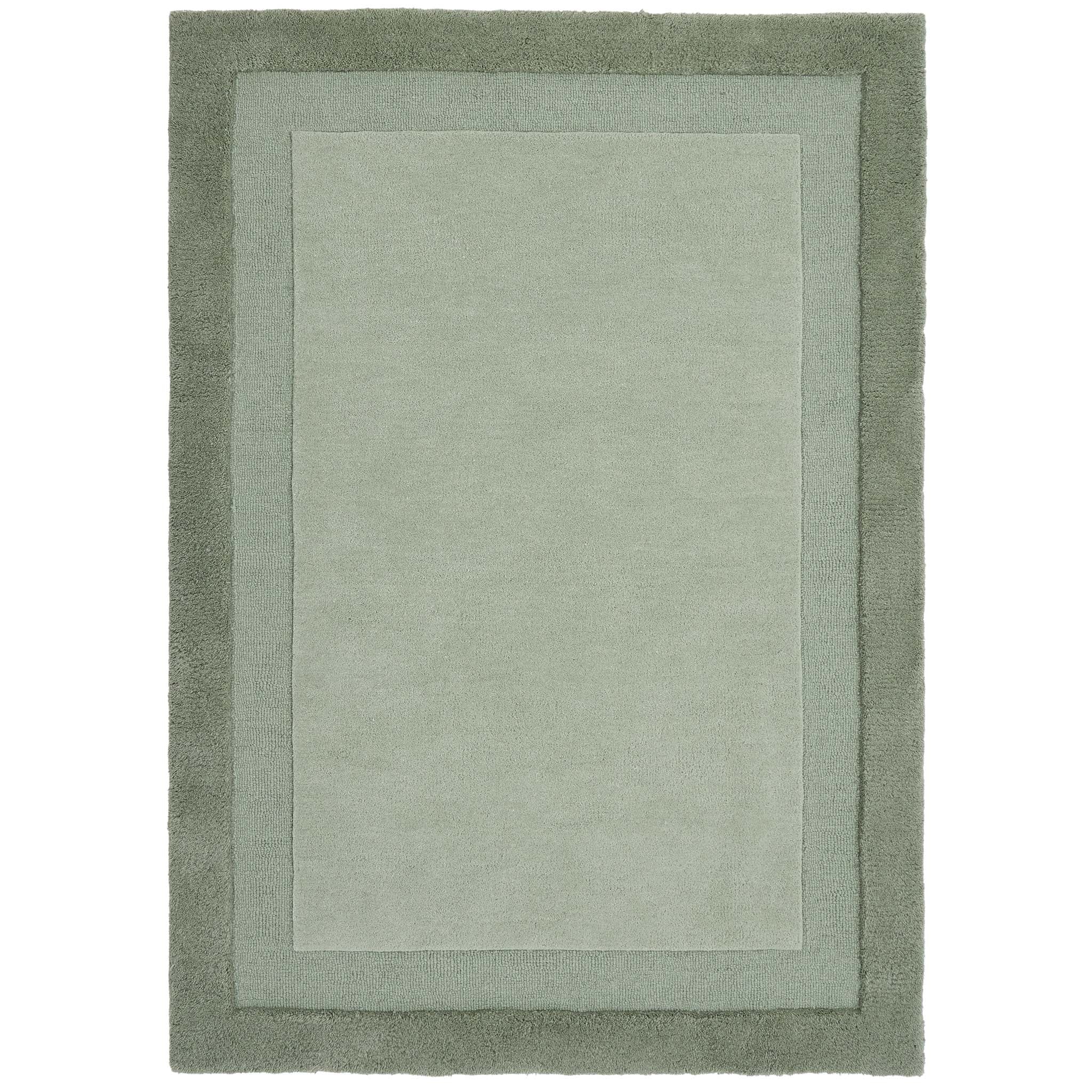 Stacked Borders Soft Green Rug. Made from 100% wool featuring a border design.