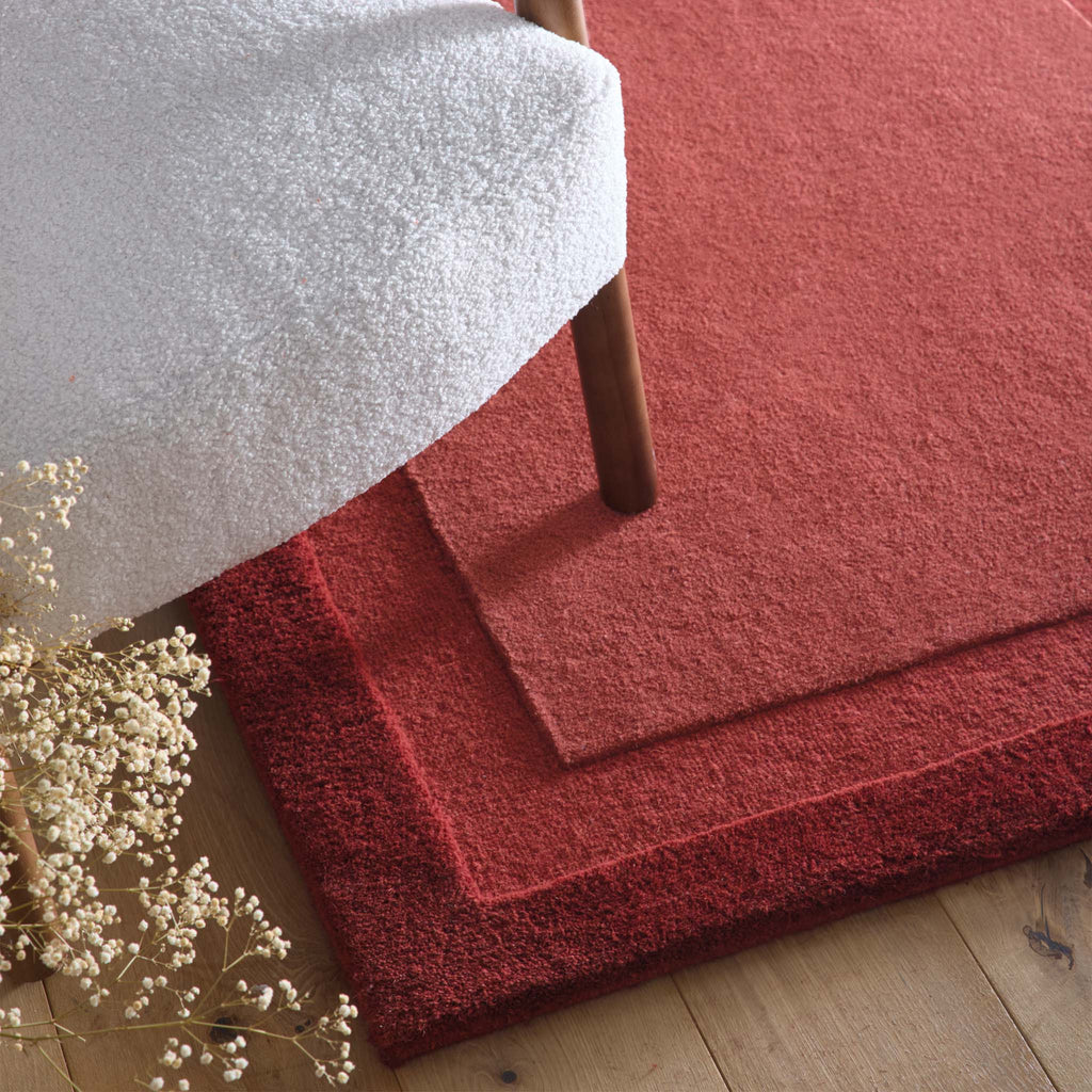 Stacked Borders Wine Red Rug- 100% wool rug with two shades of red. 