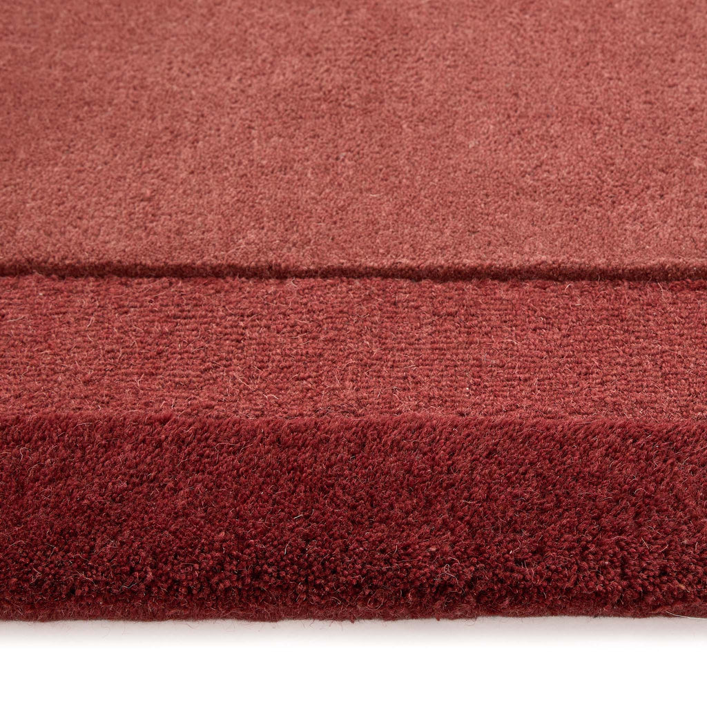 Stacked Borders Wine Red Rug- 100% wool rug with two shades of red. 