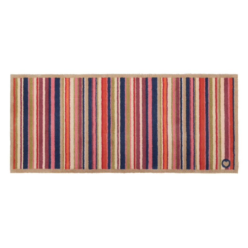 Sunset Stripe washable runner- a 100% recycled cotton runner featuring colourful stripes in pink, green, white, orange, blue, and purple. 