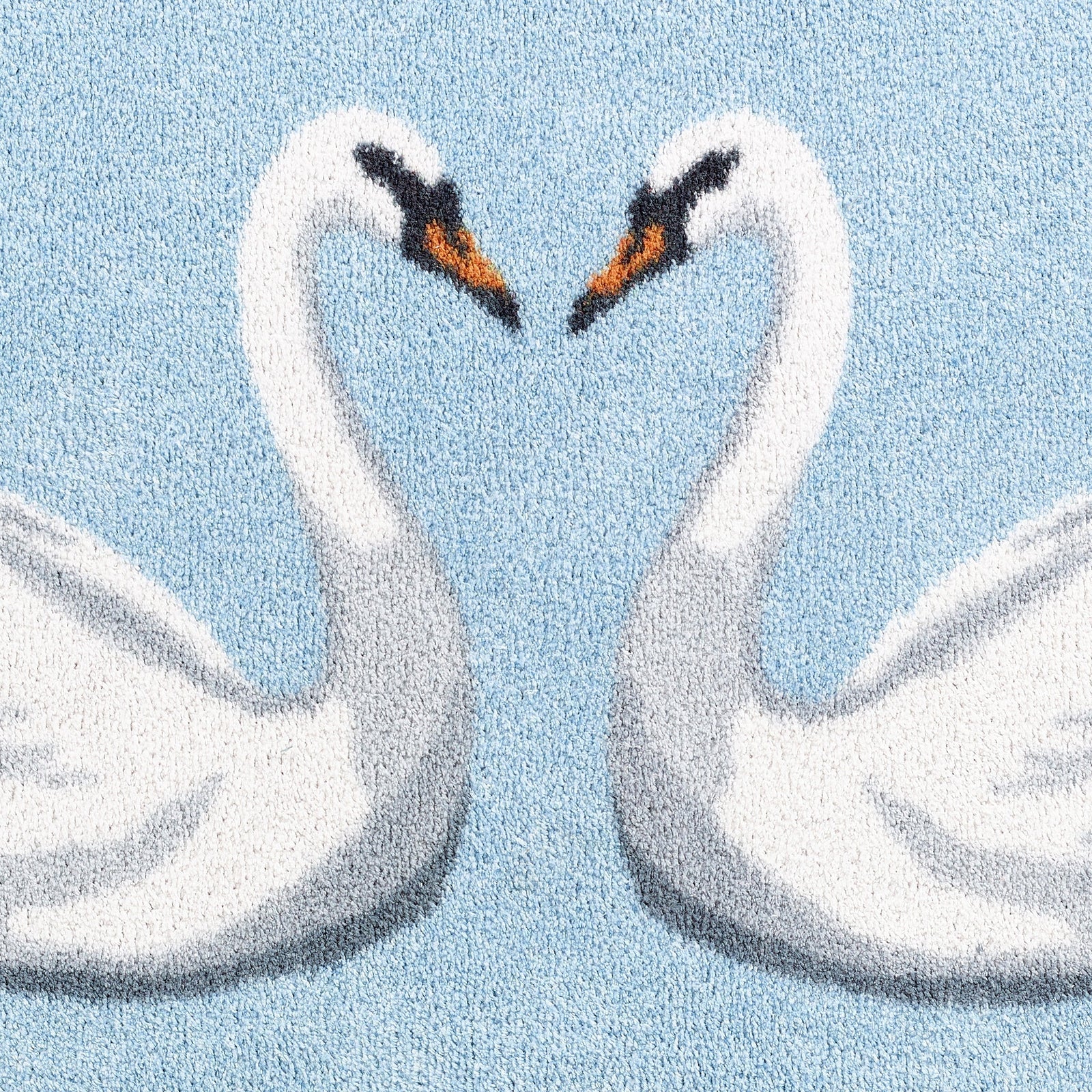 Swan 1 Bath Mat made from 100% recycled materials, featuring two white swans. 