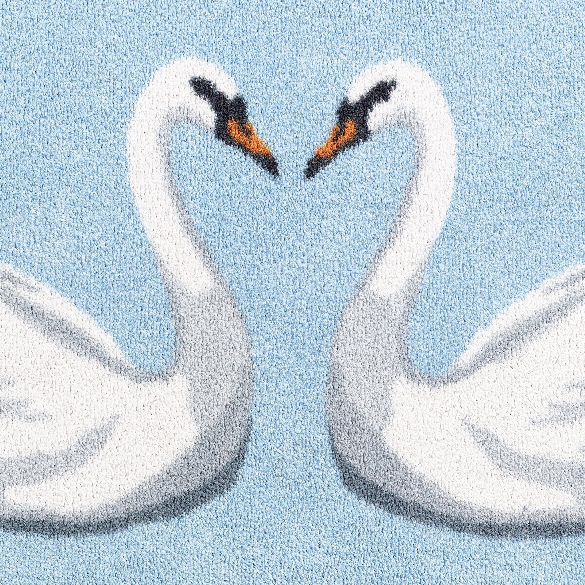 Swan 1 Bath Mat made from 100% recycled materials, featuring two white swans. 