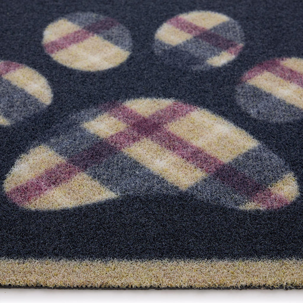 Tartan Paw Outdoor Doormat- 100% recycled nylon doormat featuring a tartan paw print. 