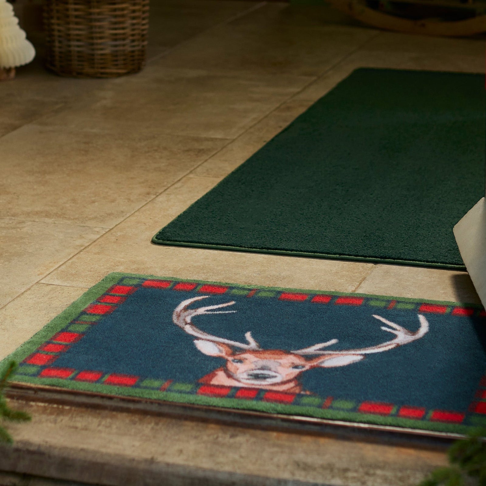 Tartan Stag Washable Doormat made from 100% recycled cotton, featuring a stag surround by a tartan border. 
