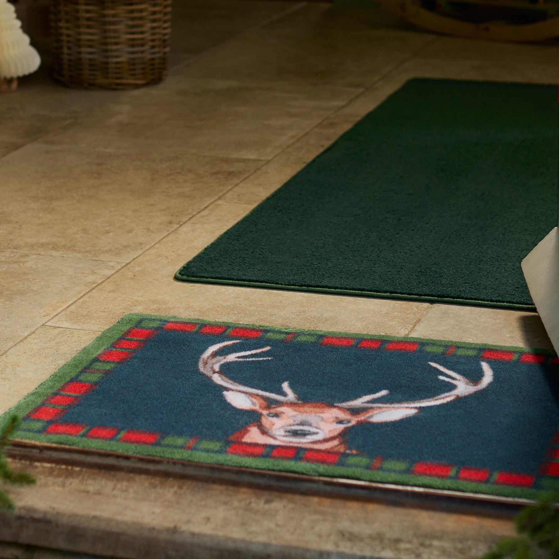 Tartan Stag Washable Doormat made from 100% recycled cotton, featuring a stag surround by a tartan border. 