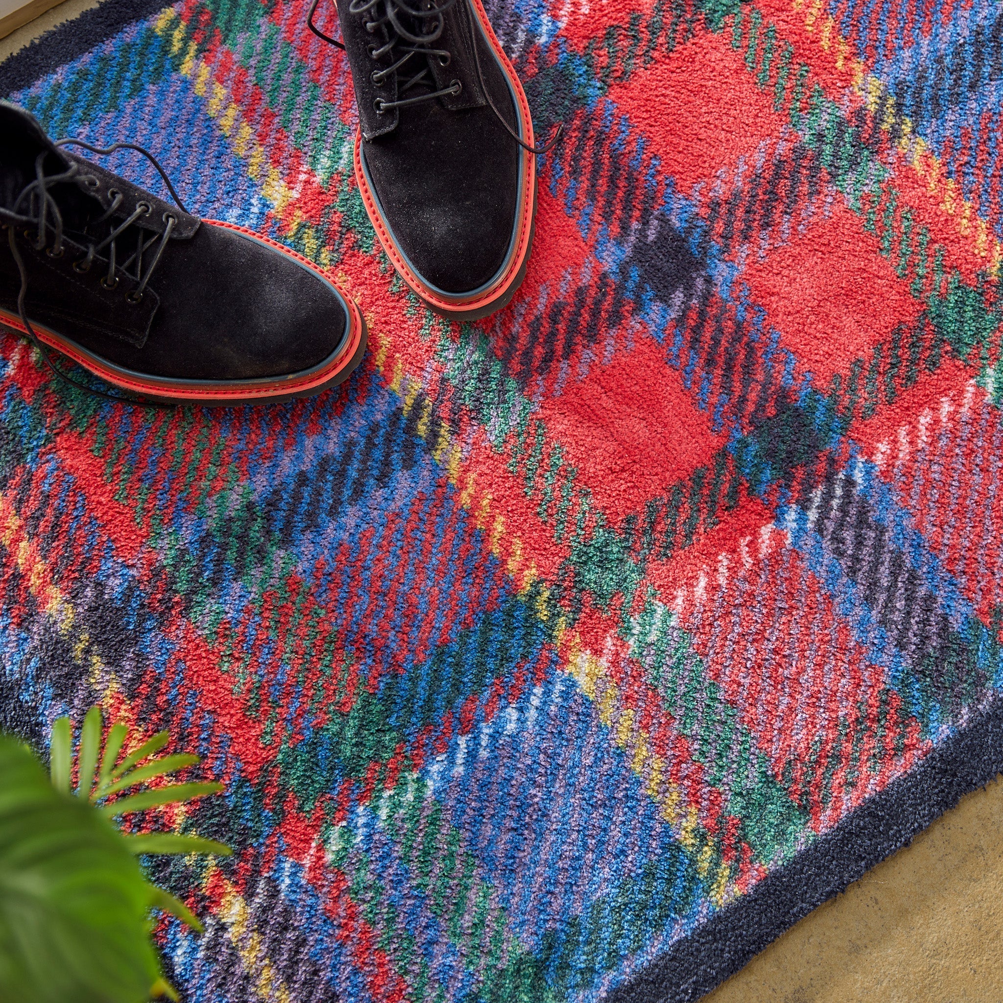 Tartan Red/Blue Washable Doormat made from 100% recycled cotton, featuring a tartan design in red and blue.