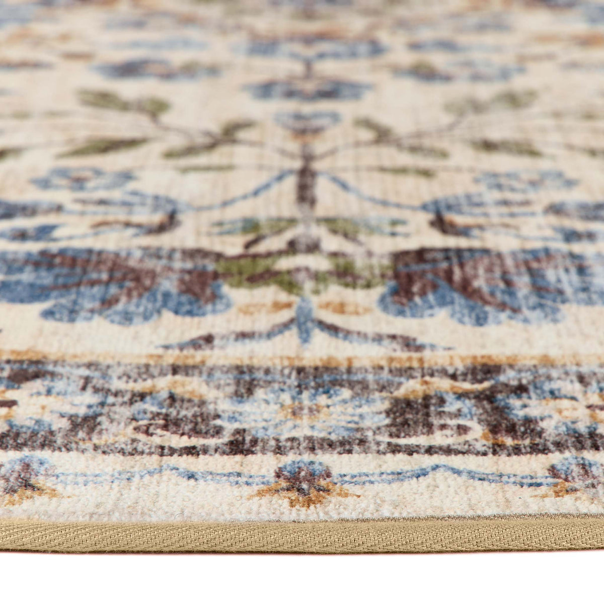 Close-up of Cottage Garden Eco-Washable Circle Rug with a floral design.