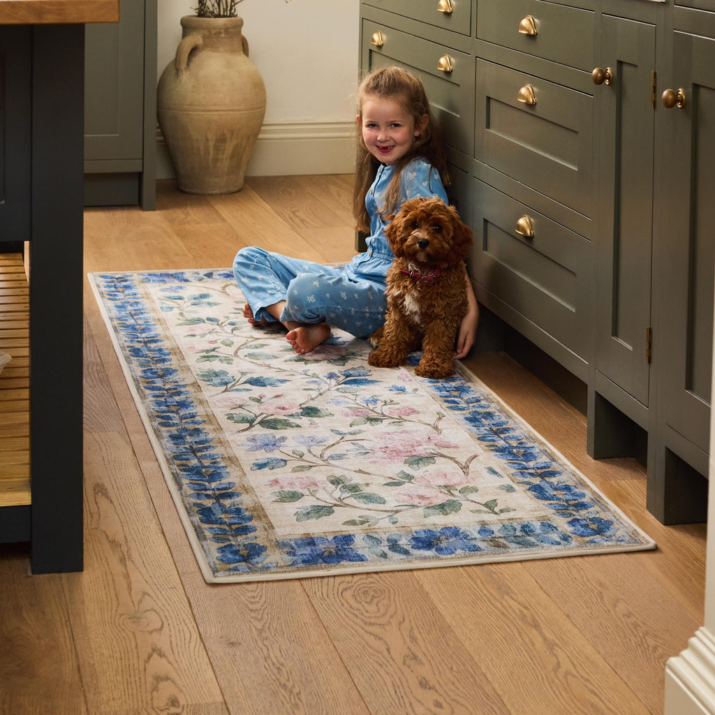 The Lady Rose Eco-Washable Runner - a beige and green eco-washable runner featuring blue and pink florals and green leaves.