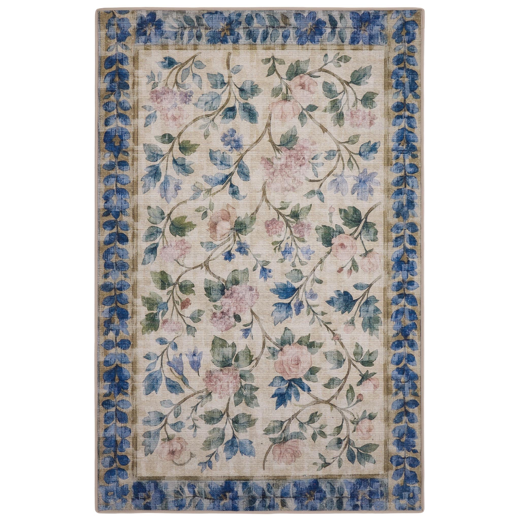 The Lady Rose Eco-Washable Rug - a beige and green eco-washable rug featuring blue and pink florals and green leaves.