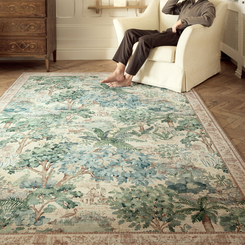 The Stumpery Fern Eco-Washable Rug with a nature inspired pattern, styled in a living room. 