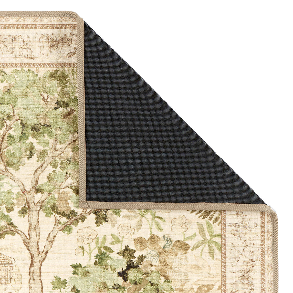 Close-up of The Stumpery Lichen Eco-Washable Rug showing a nature inspired pattern and the rubber backing. 