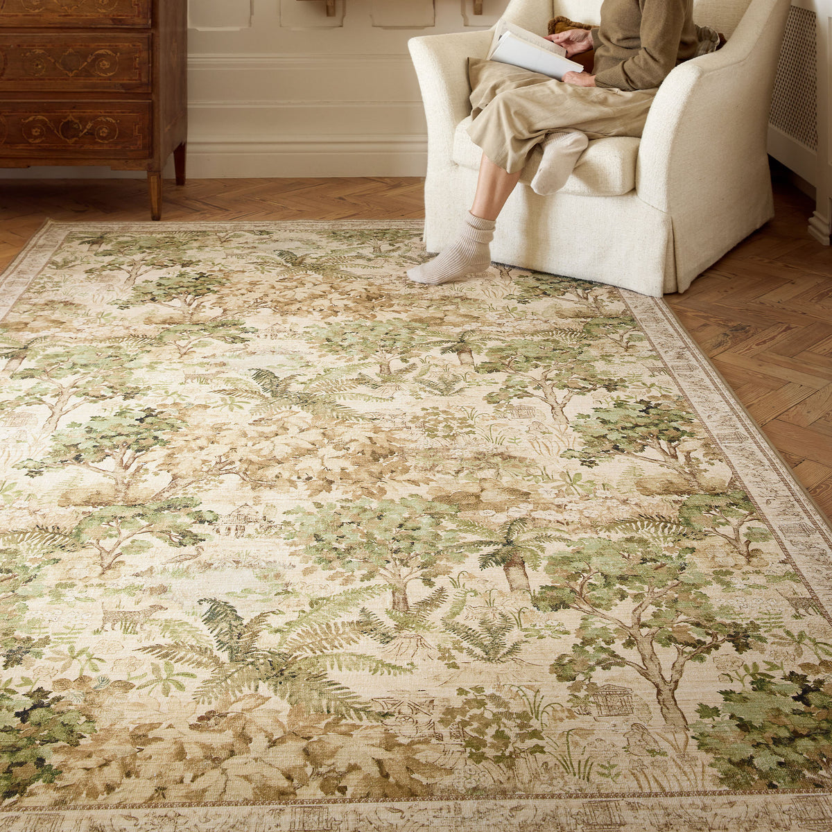 The Stumpery Lichen Eco-Washable Rug with a nature inspired pattern, styled on wooden flooring. 