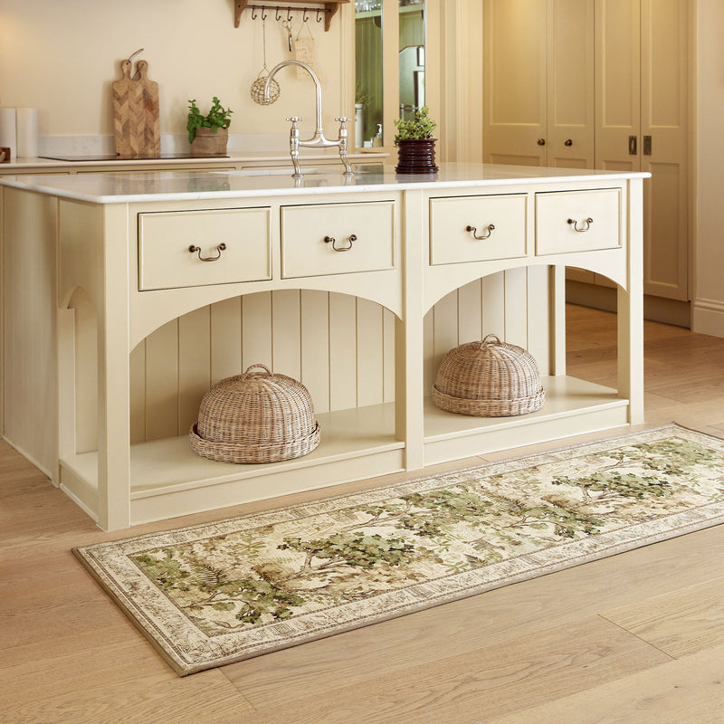 The Stumpery Lichen Eco-Washable Runner with a nature inspired pattern, styled on wooden flooring. 