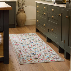 The Wildflower Patch Eco-Washable Runner- a beige eco-washable runner featuring vibrant florals.