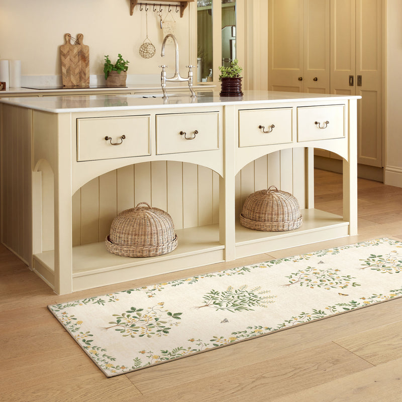 Thyme Walk Lichen & Gooseberry Eco-Washable Runner, styled on wooden flooring.