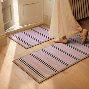 Timeless Stripe Blush Doomat- 100% recycled cotton doormat featuring a pink and beige striped pattern.