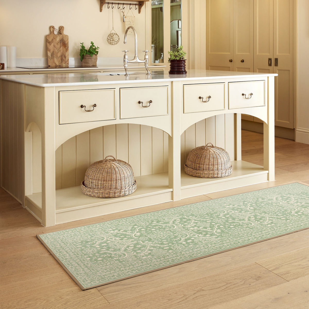Topiary View Thyme Eco-Washable Runner with a heritage style pattern in green, styled on wooden flooring.