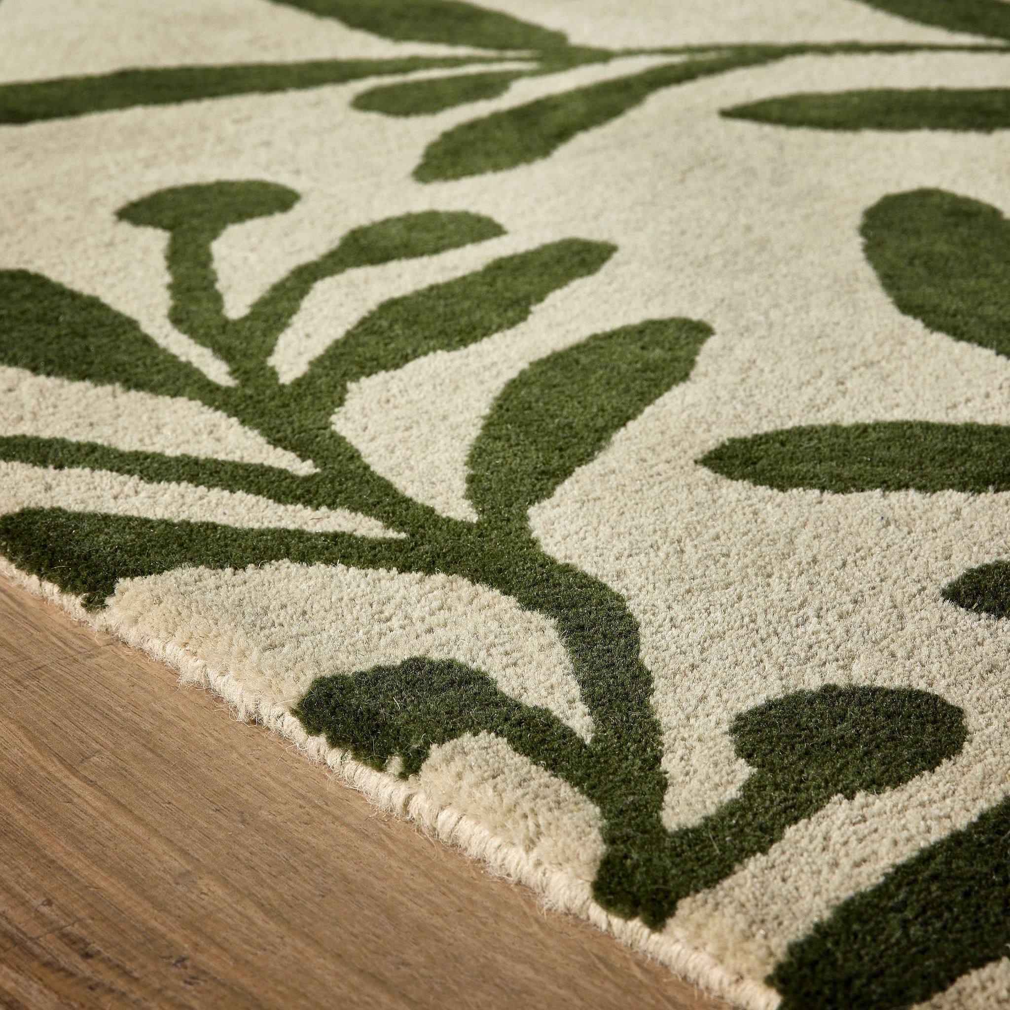 Trailing Leaf Rug -made from 100% wool  featuring a leaf design. 