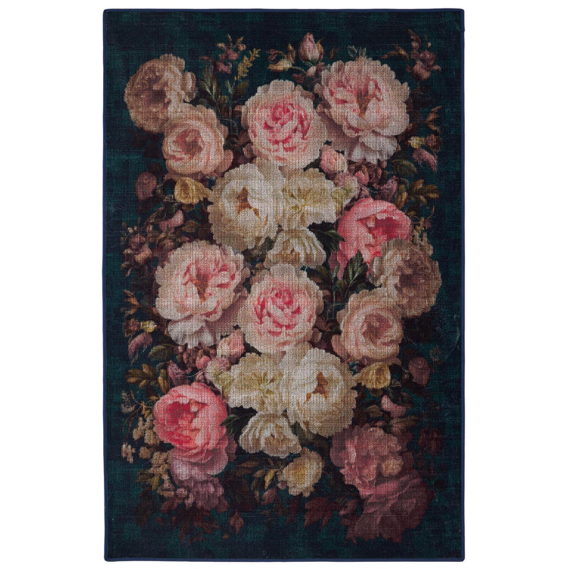 Twilight Garden Eco-Washable Rug made from 100% recycled materials, featuring an oversized bloom pattern against a black background.