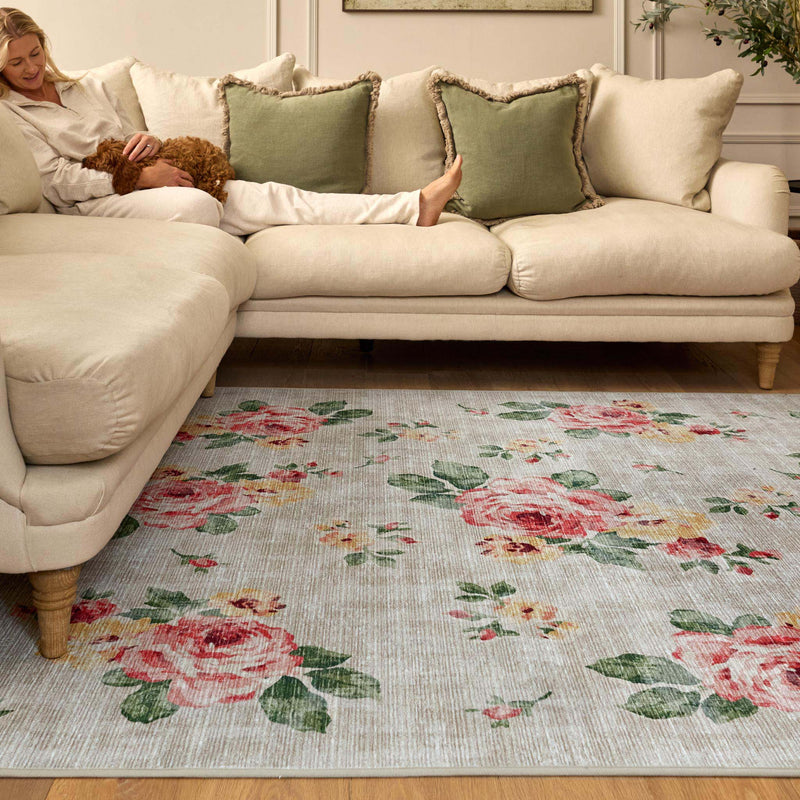 Vintage Rose Natural Eco‑Washable Rug with a pink and yellow rose design, styled in a living room.