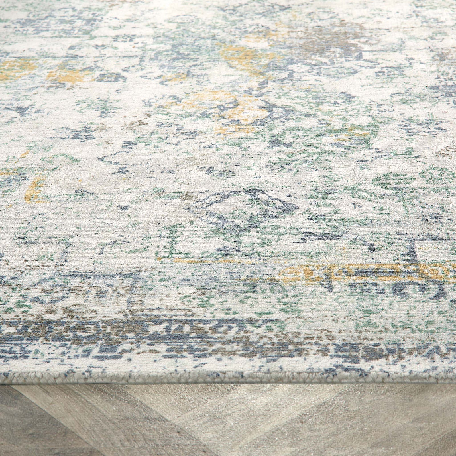 Vogue Blue/Ochre Rug made from 100% PET recycled materials, featuring a worn out vintage inspired design.