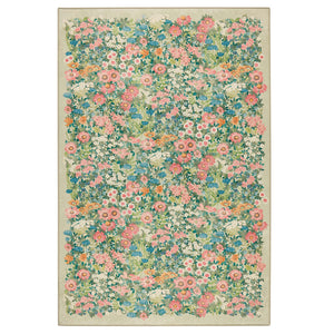 Wallflower Sage Eco-Washbale Rug in Green with a floral design.