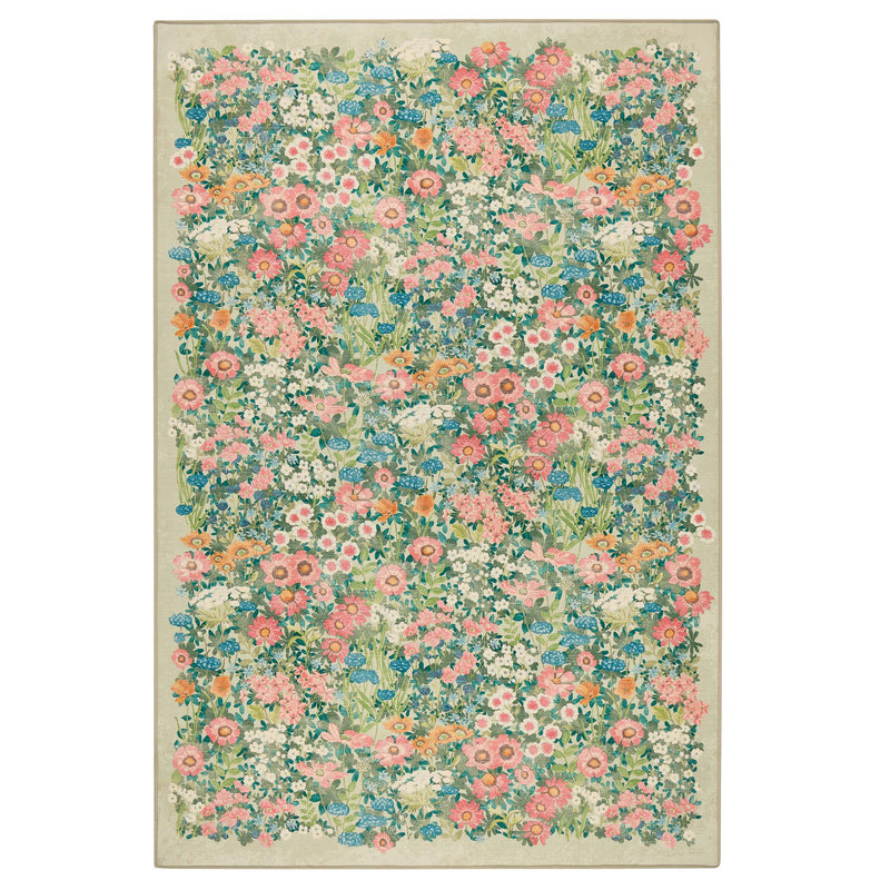 Wallflower Sage Eco-Washbale Rug in Green with a floral design.